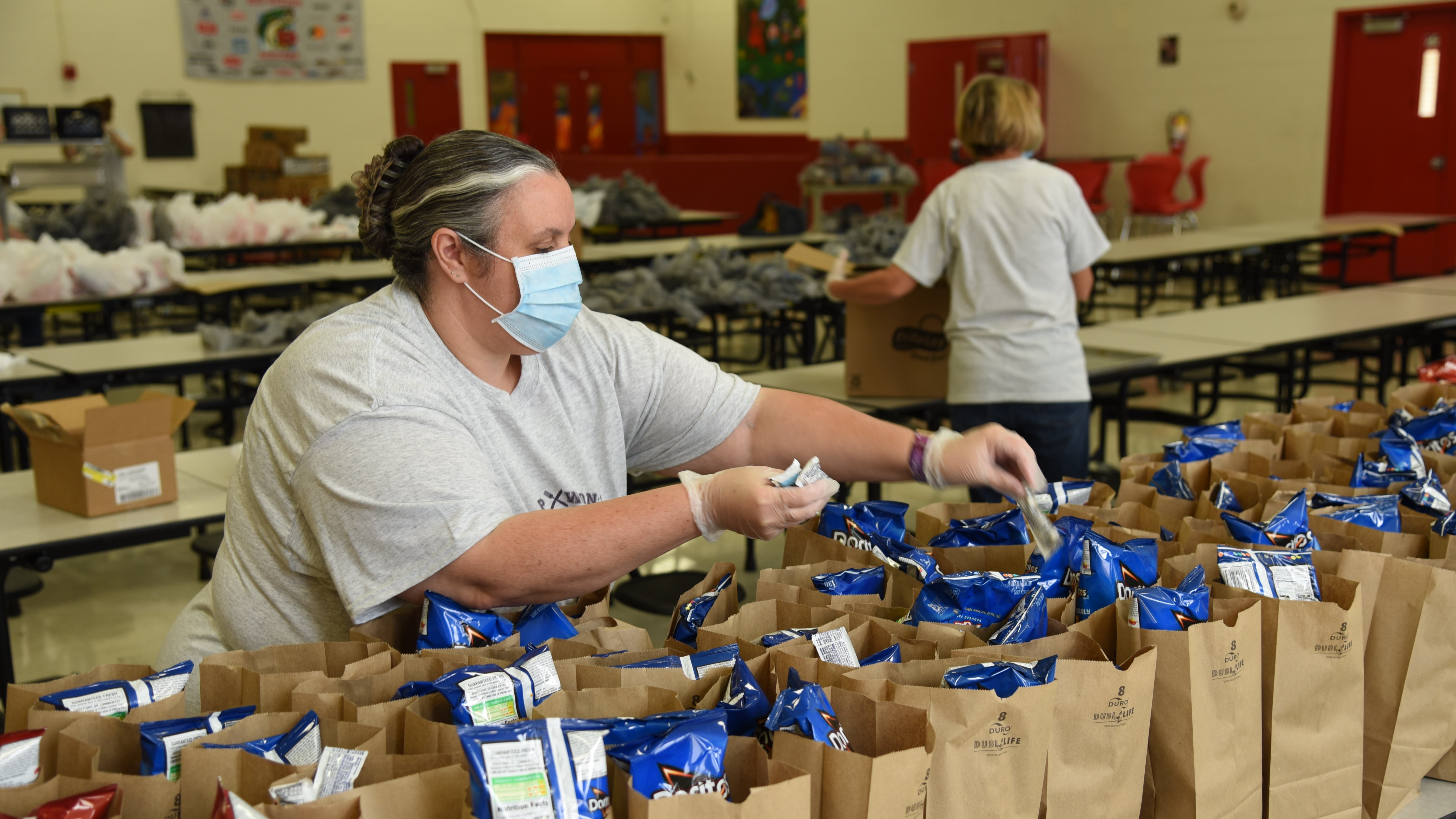 Nutrition employees at Halls High School prepare meals on April 29, 2020. Nutrition employees at Halls High School prepare meals on April 29, 2020.